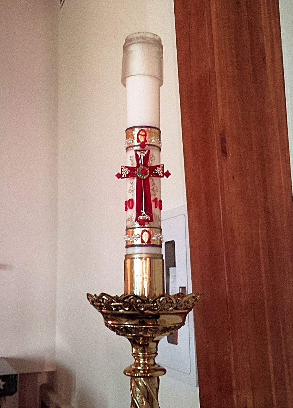 We light this candle during the Easter season and during Baptisms.