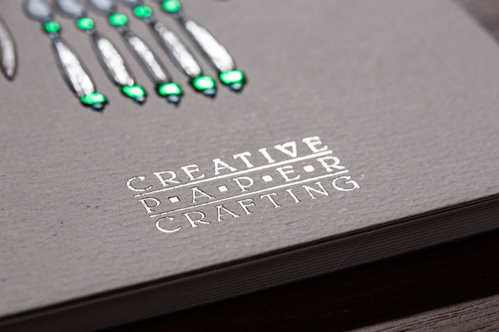 CPC Notebook with an 8 Registered Foil Pass + a Registered Sculpted Emboss on Uncoated Cover done by Creative Paper Crafting, Portland, Oregon.