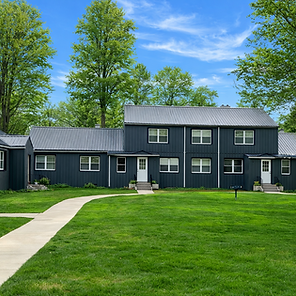 Modern U-shaped home with greenery.png
