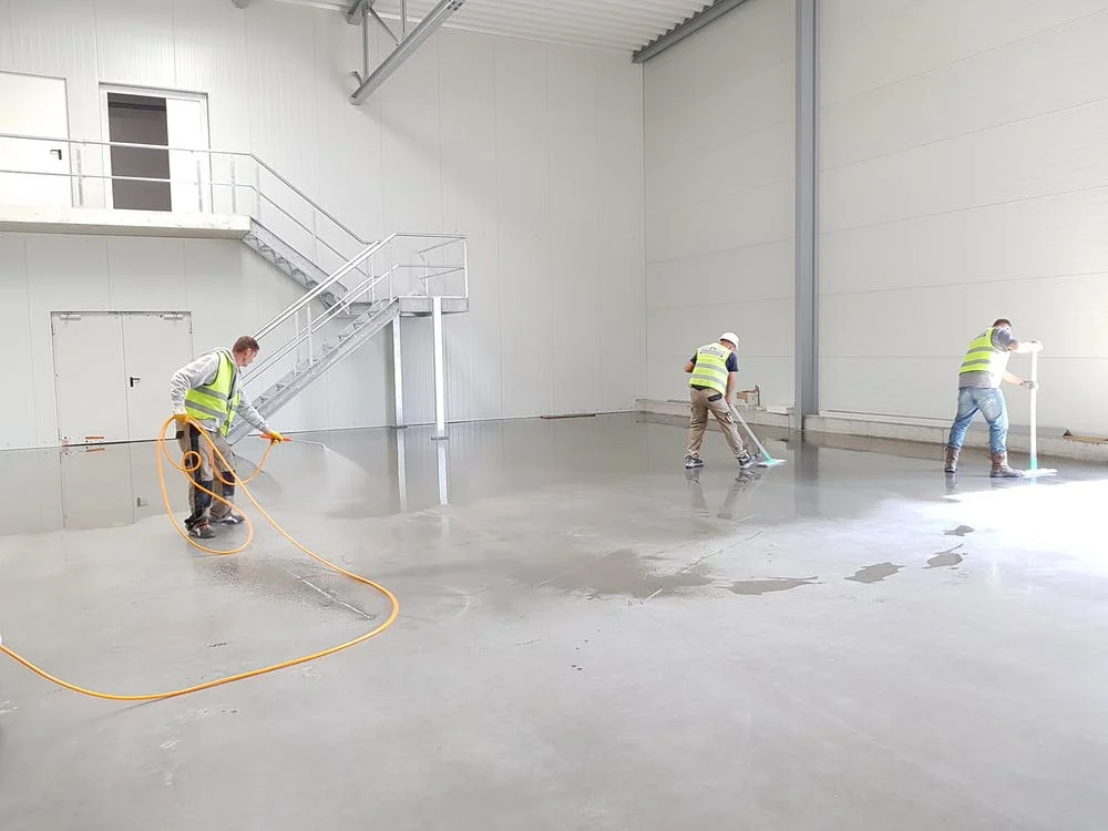 Men cleaning floor