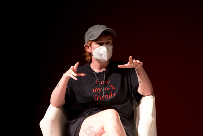 A photo of Sop speaking on the panel.