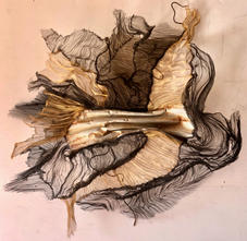 Out the back, Corrugated iron, Aluminium and bronze mesh,2021, 145 x 140 x 25.jpeg
