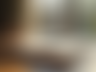 Year-end reflection journal with pen on wooden table