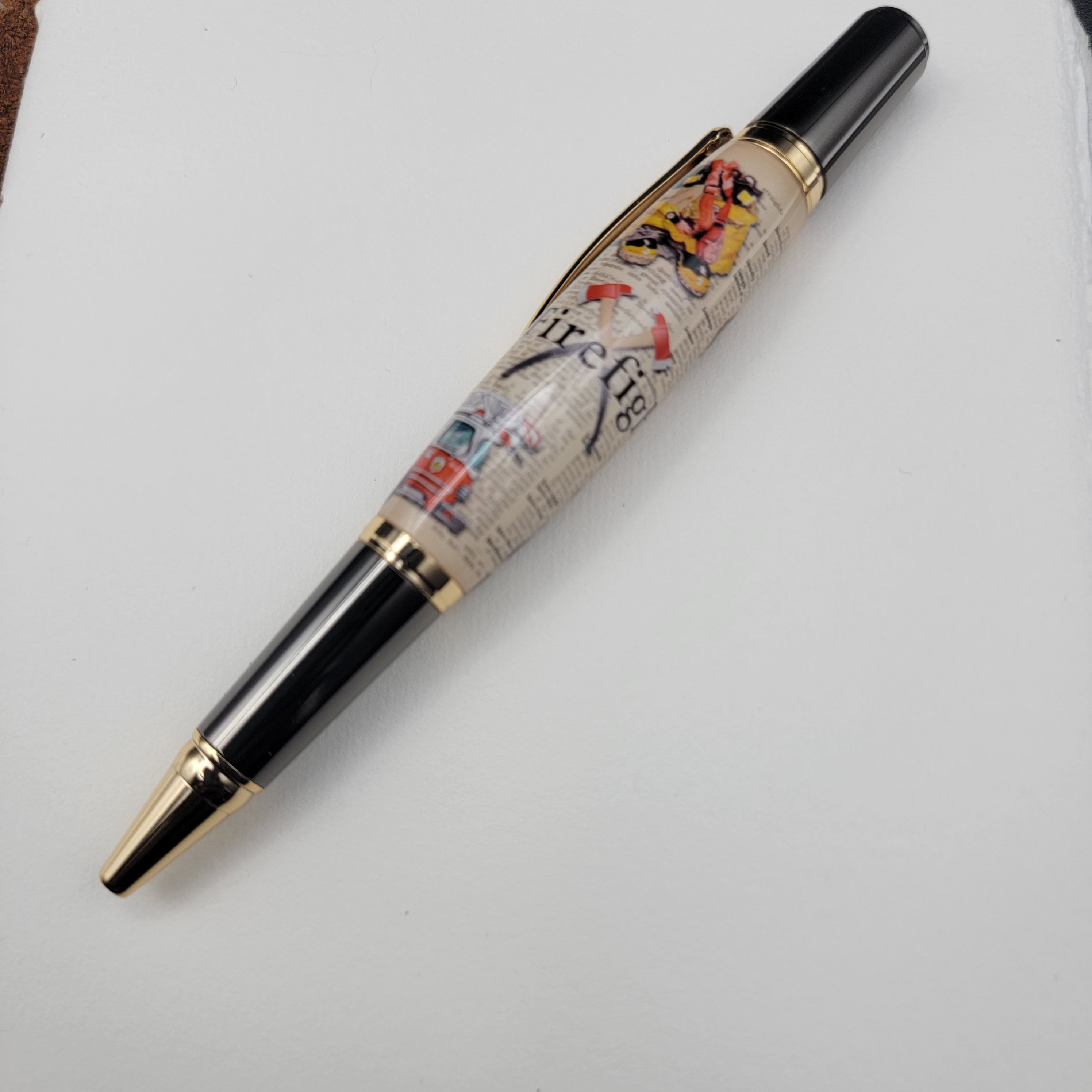 Sierra Style "Firefighter" on Newsprint Ballpoint Pen with Gold Metal Finish