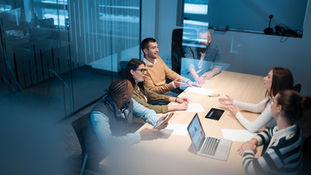 global team communicating in a meeting