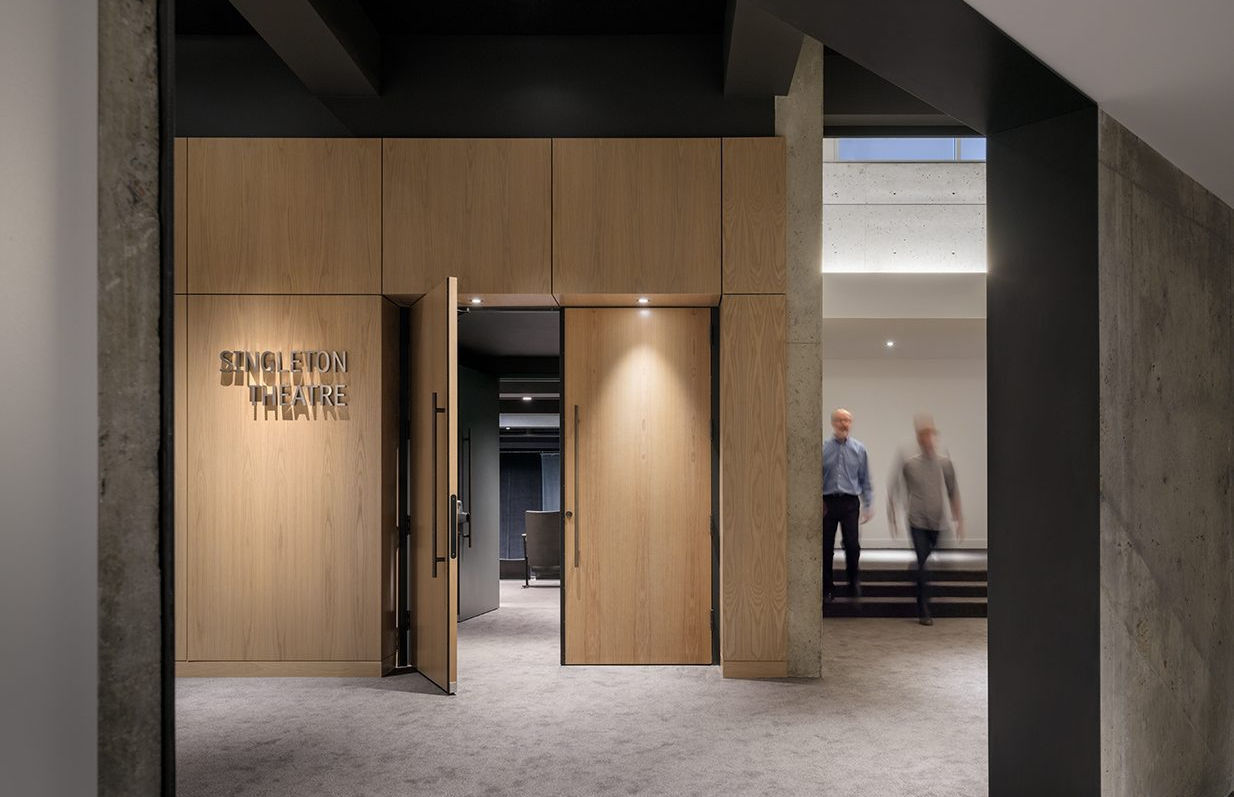An interior view of the Lobby at the Denver Center for the Performing Arts during daytime. Looking at the Singleton Theatre entrance.