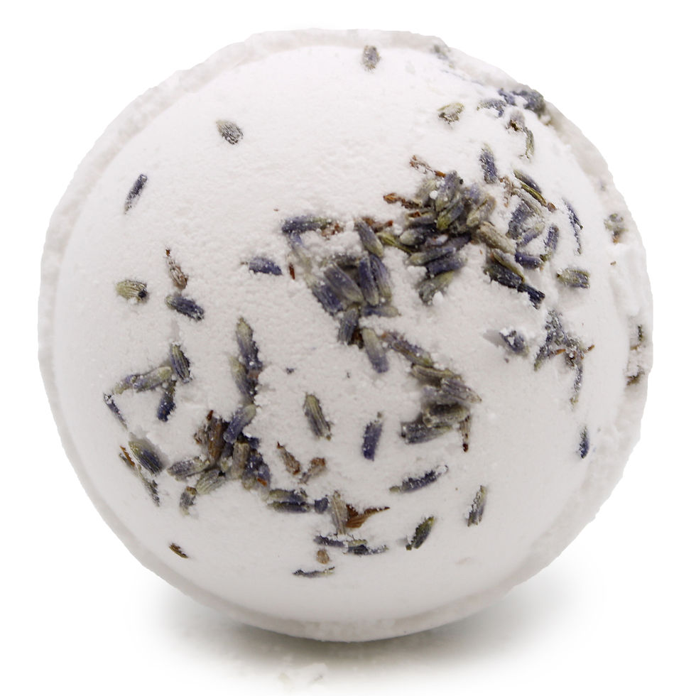 A close-up of a white bath bomb sprinkled with dry lavender petals, showcasing its textured, organic appearance.