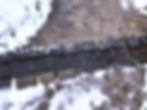Stones across a snowy path