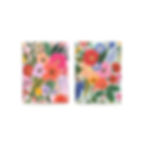 Two small, coordinating notebooks with bright, bold floral print on covers laid side-by-side.