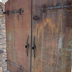 Rust-colored wrought iron gate in Old Bisbee near Brewery Gulch, captured during the Bisbee Downtown Tour with Big Jeep Tours.