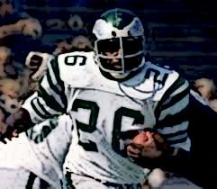 football player running with a football