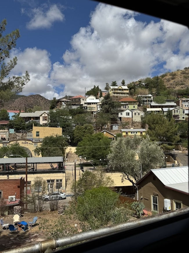 Eye-level view of historic Bisbee mining district with colorful hillside buildings
