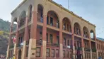 The historic brick Post Office building in downtown Bisbee, Arizona, a stopping point on a local landmark route with Big Jeep Tours.
