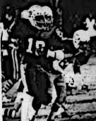 football player in dark uniform