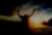 Grateful man man raising his hands in worship in the countryside_edited.jpg