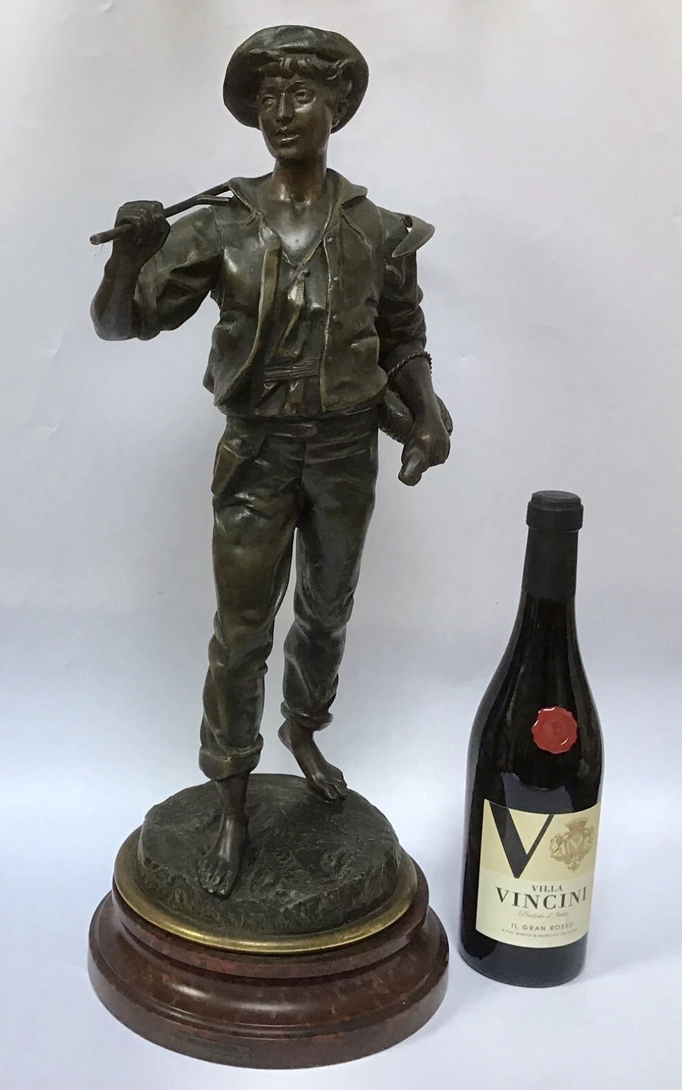 Antique French Statue of a boy by Laverne