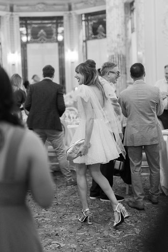 Timeless black-and-white photo capturing the bride in her second look