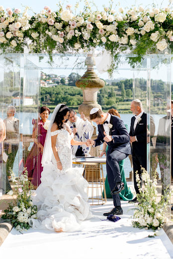 The groom broke the glass during the Jewish ceremony