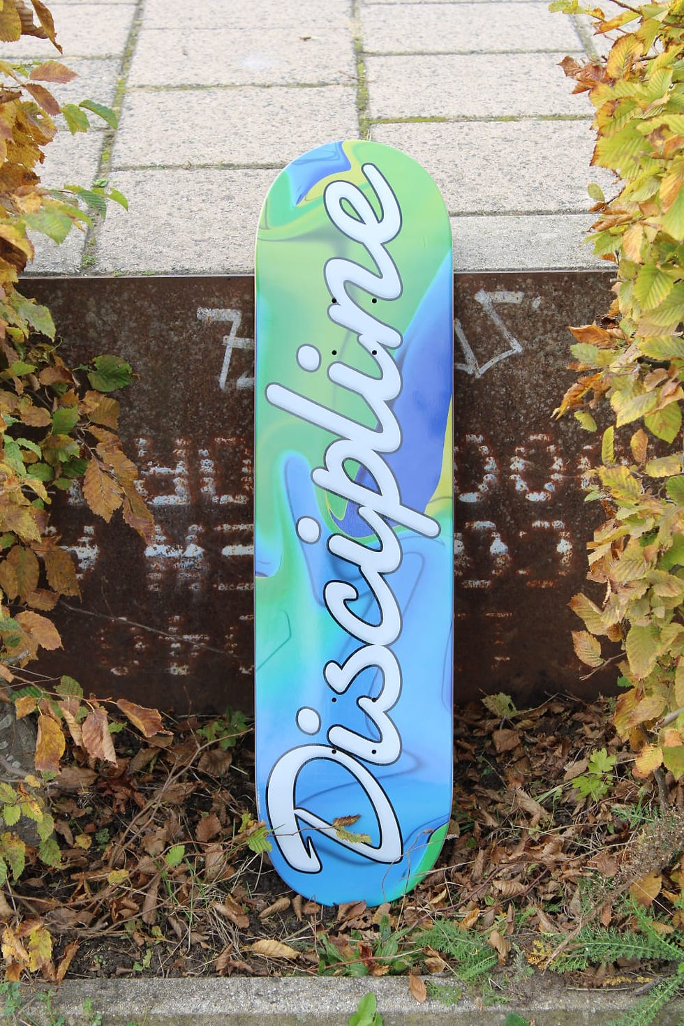 Thumbnail: Vertical Front view Discipline Tie Dye Skateboard deck