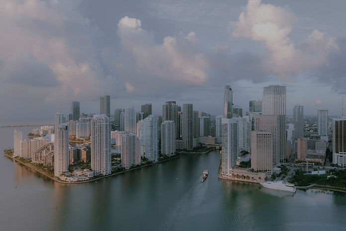 a large body of water surrounded by tall buildings_edited.jpg