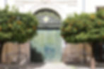green door with orange trees, sant'agata