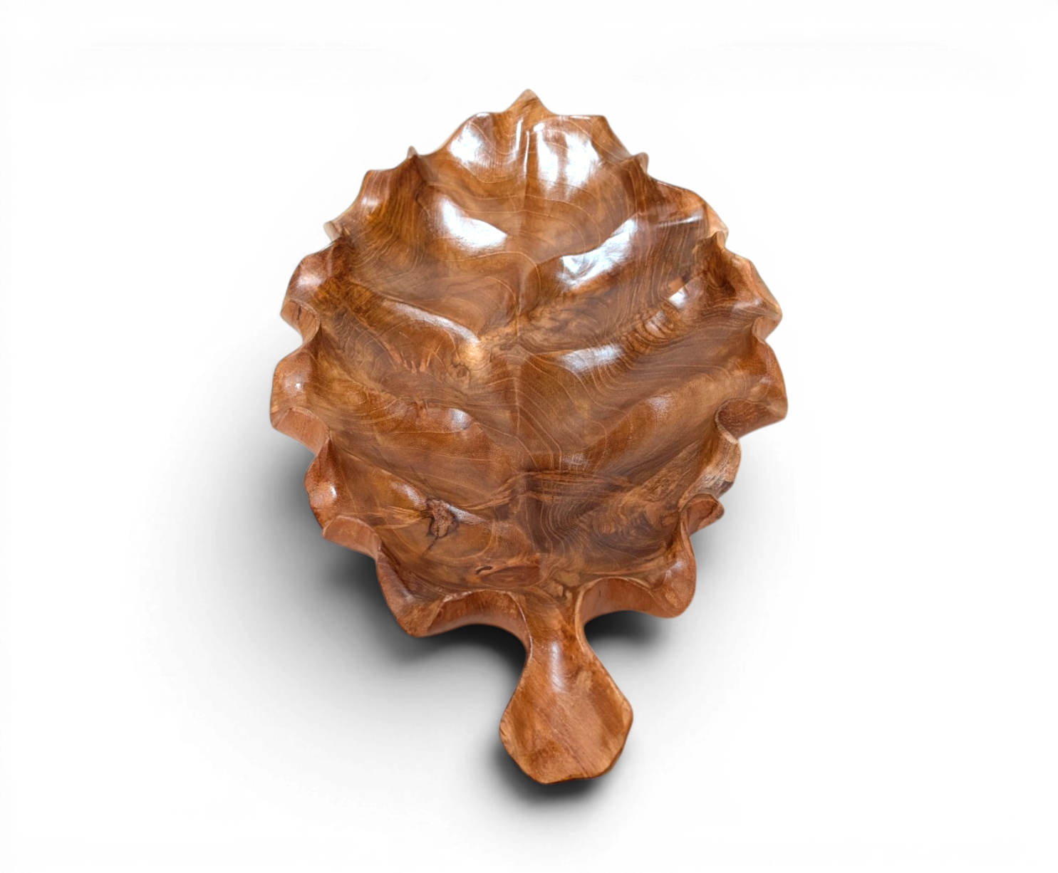 Hand carved dark teak lotus leaf tray from Bali with sculptural rippled edges