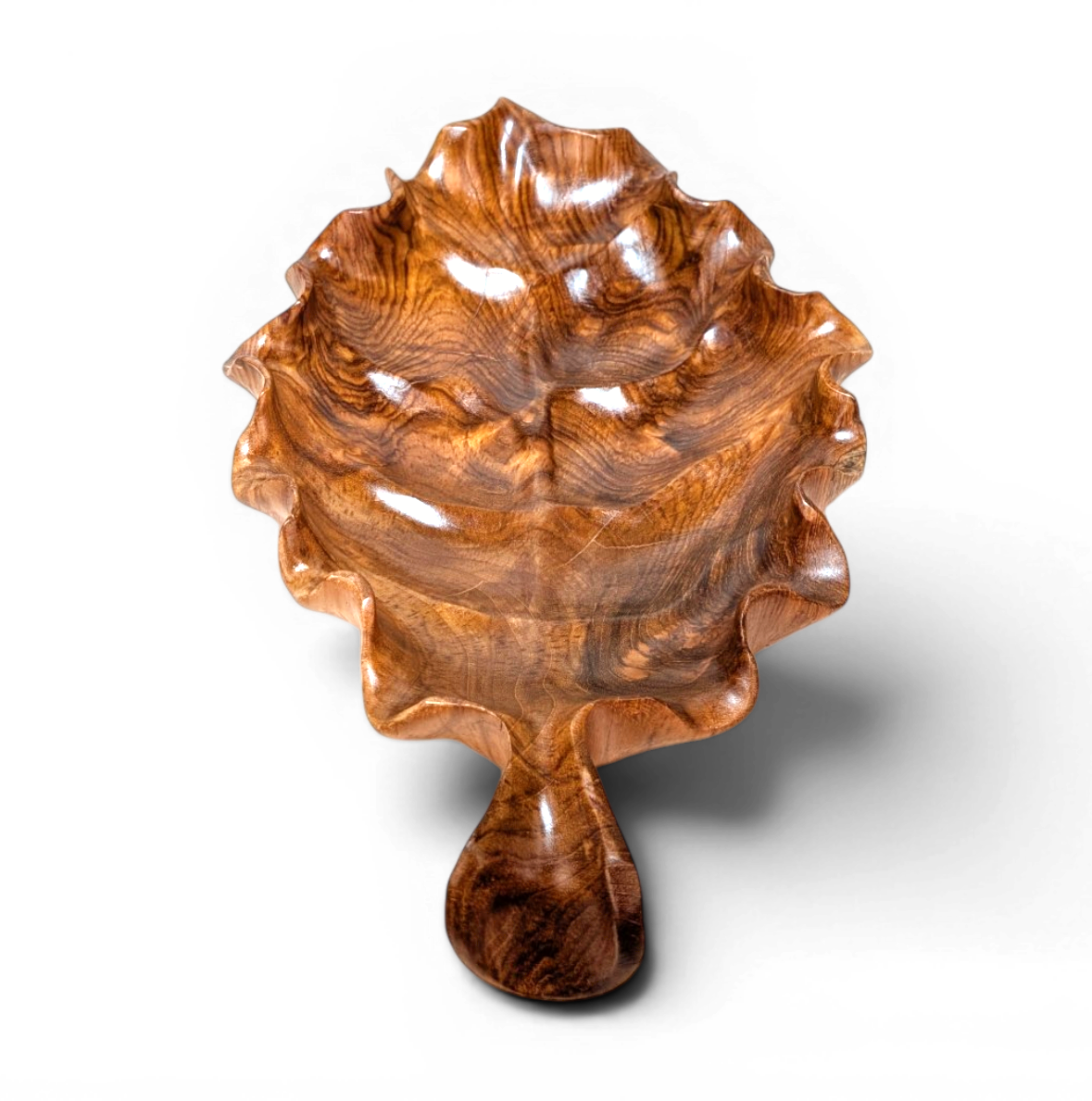 Hand carved Bali teak lotus leaf tray with long shape and wavy sculptural edge