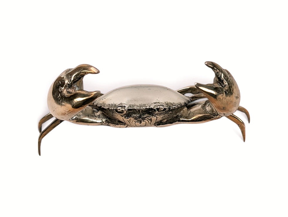 Thumbnail: Decorative brass crab statue for a beach house interior