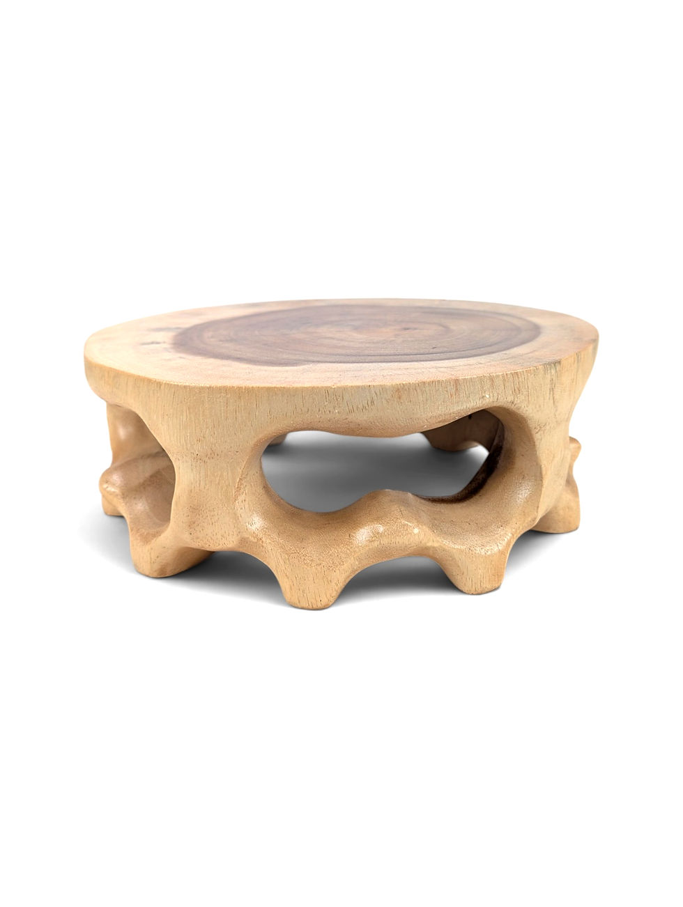 Round teak table riser with circular grain patterns