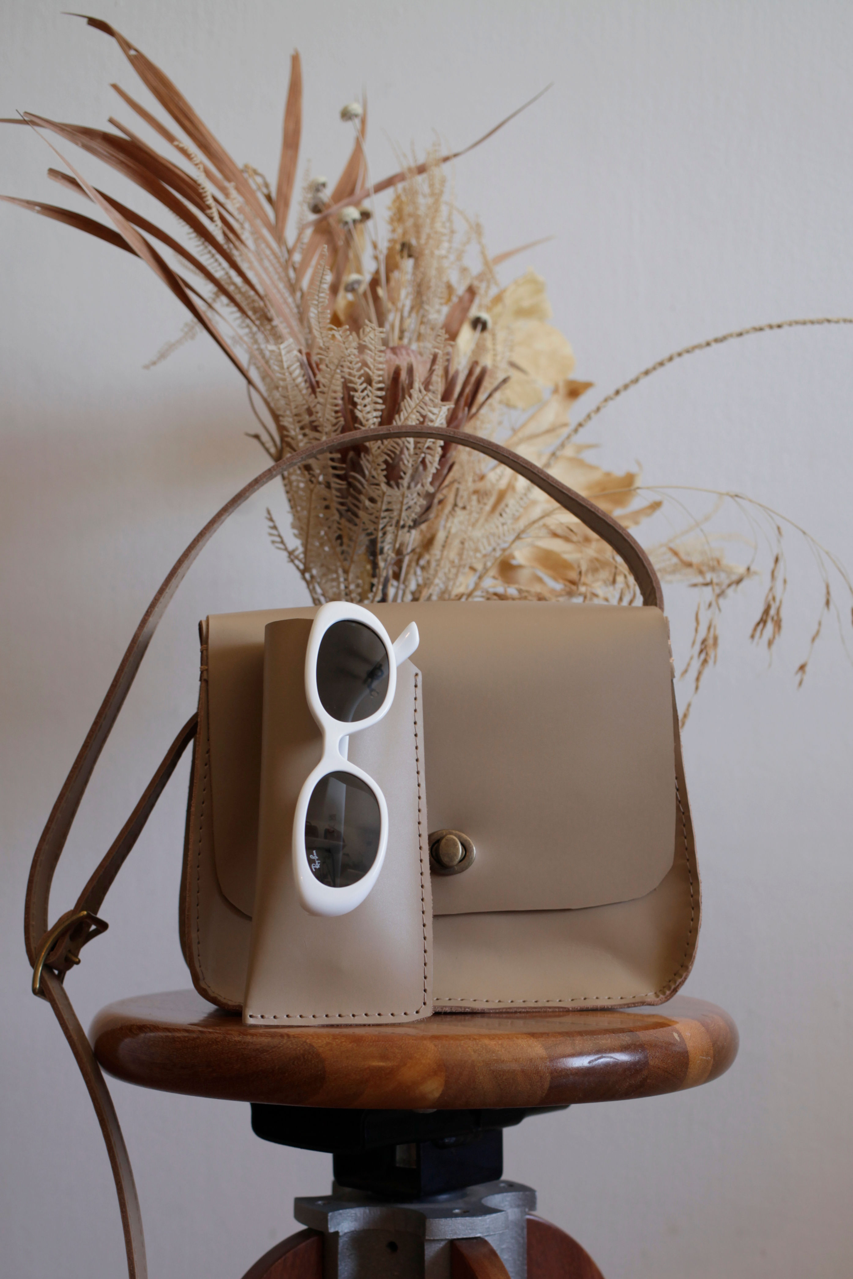 Bolsa Saddle Pumila Avelã