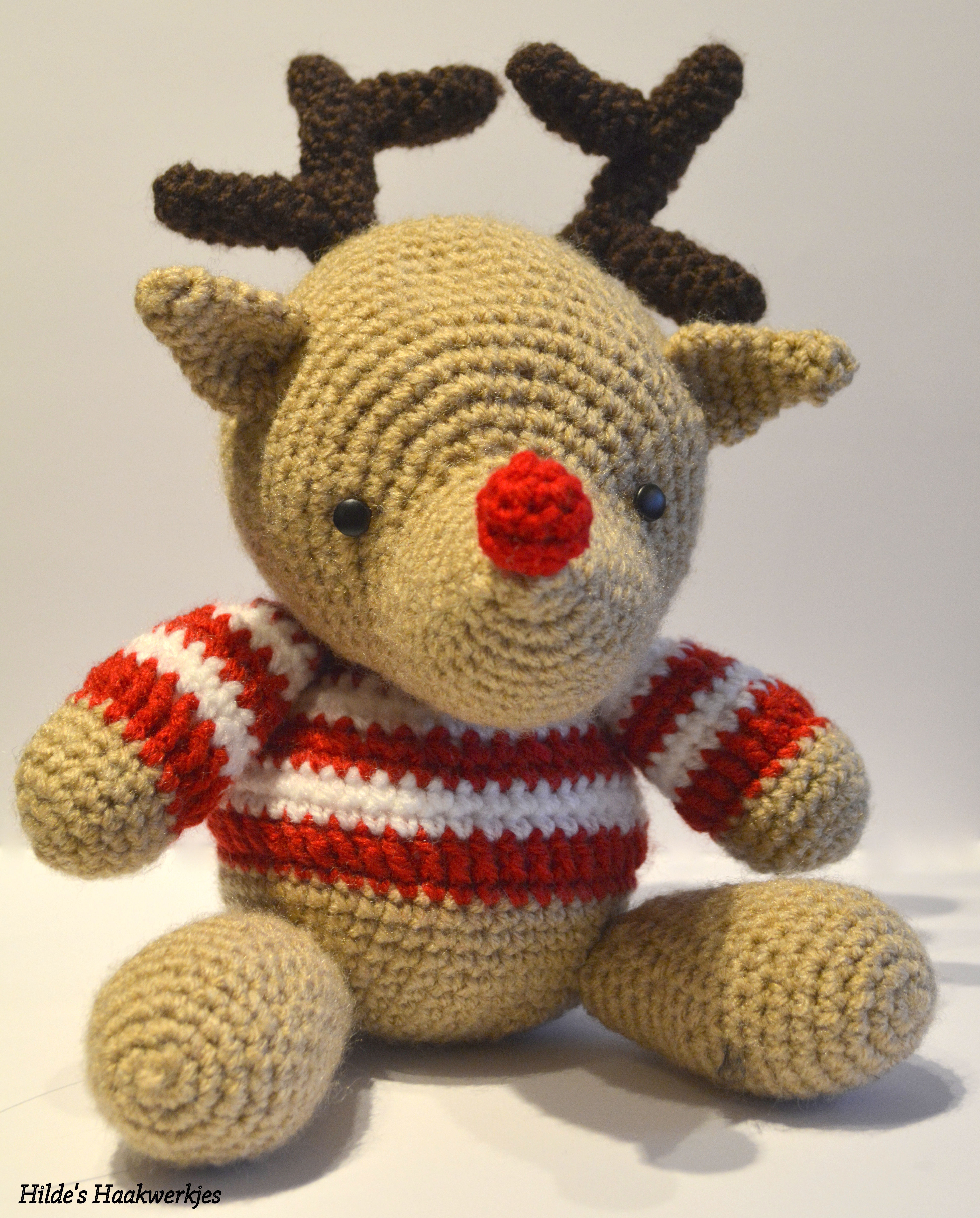 7. Rendier met streepjes trui