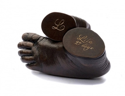 Life size casting of baby feet made in patinated bronze 