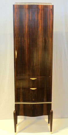 Ruhlmann-style whiskey cabinet - Art Deco details - fusee legs, holly sabots, macassar ebony and quilted sapele veneers and other unique and rare materials.