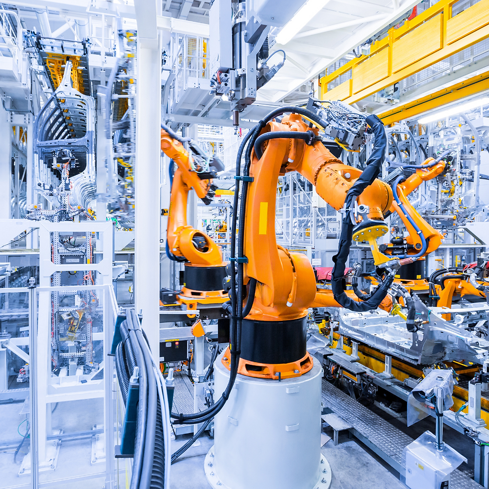 Photo of a factory using machinery in the manufacturing process