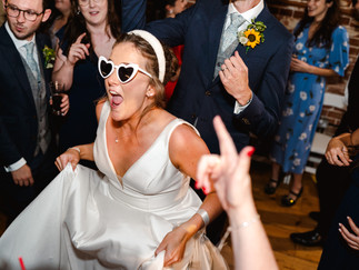 Laura and Mark’s September wedding at The Dairy Barns in Norfolk, featuring candid moments, joyful celebrations, and unique personal touches that made their day unforgettable.