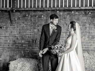 Laura and Mark’s September wedding at The Dairy Barns in Norfolk, featuring candid moments, joyful celebrations, and unique personal touches that made their day unforgettable.