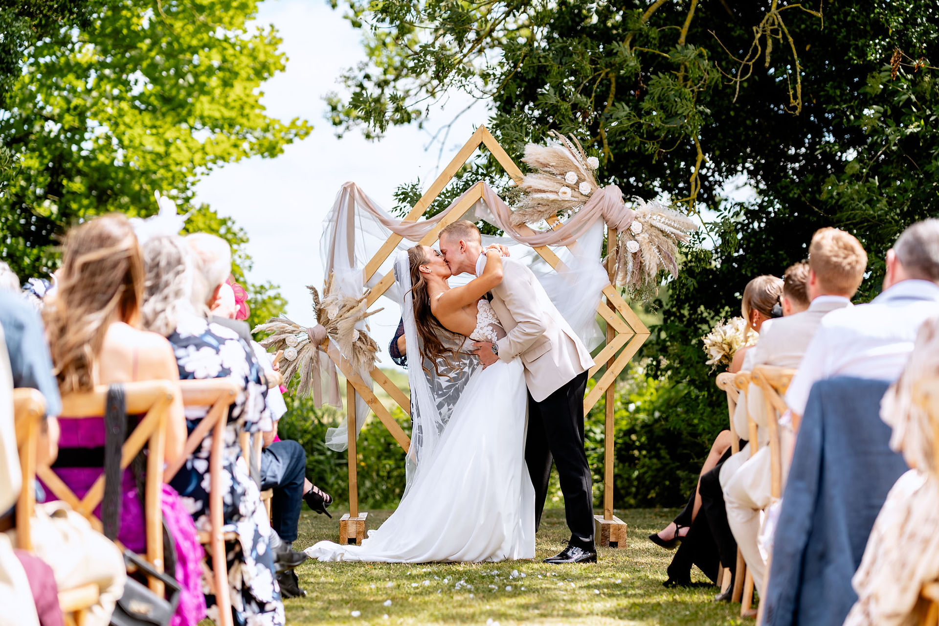 Mary and Ben’s scorcher wedding at Fishley Hall in Norfolk, featuring candid moments, joyful celebrations, and unique personal touches that made their day unforgettable.