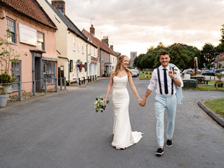 Cat and Stu's spring wedding at The Hoste Arms in Burnham Market, featuring candid moments, joyful celebrations, and unique personal touches that made their day unforgettable.