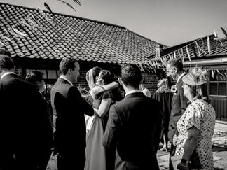 Laura and Mark’s September wedding at The Dairy Barns in Norfolk, featuring candid moments, joyful celebrations, and unique personal touches that made their day unforgettable.