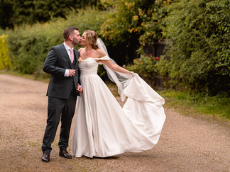 Sophie and Tom’s summer wedding at Hautbois Hall in Norfolk, filled with laughter, colourful confetti, a magician, and candid moments in the sunshine