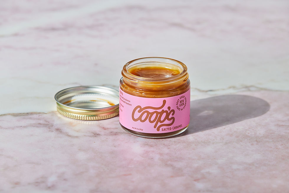 Open jar of coop's mini salted caramel sauce