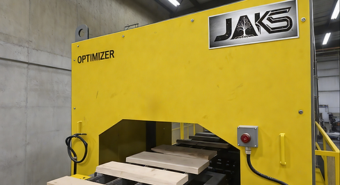 JAKS Transverse Lumber Optimizer installed on a lumber conveyor for 3D and colour scanning