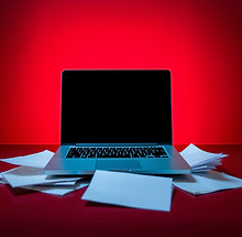 LAPTOP WITH PAPERS.jpg
