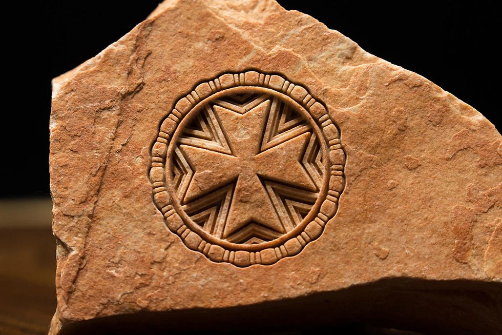 Thumbnail: Close-up of Maltese Cross stone engraving detail