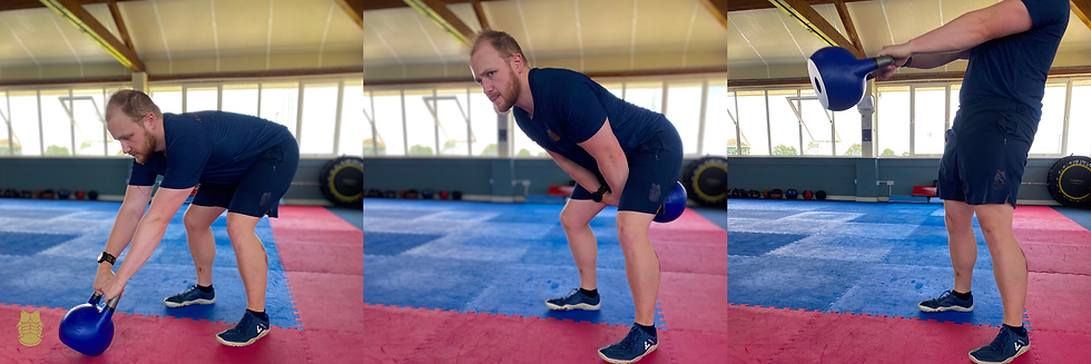 A trainer showing the mechanics for the hike start into kettlebell swing