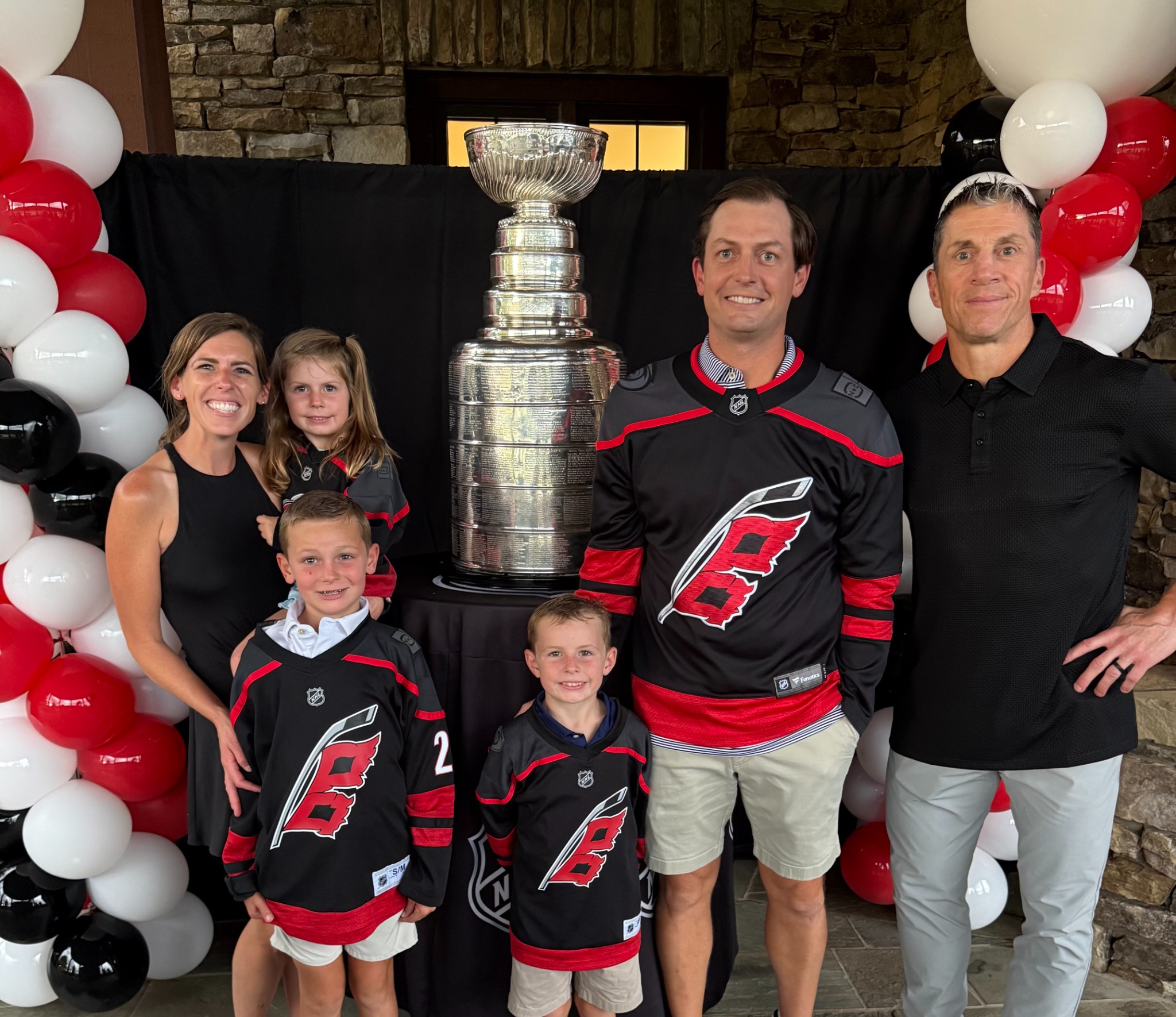 Family enjoying a hockey celebration