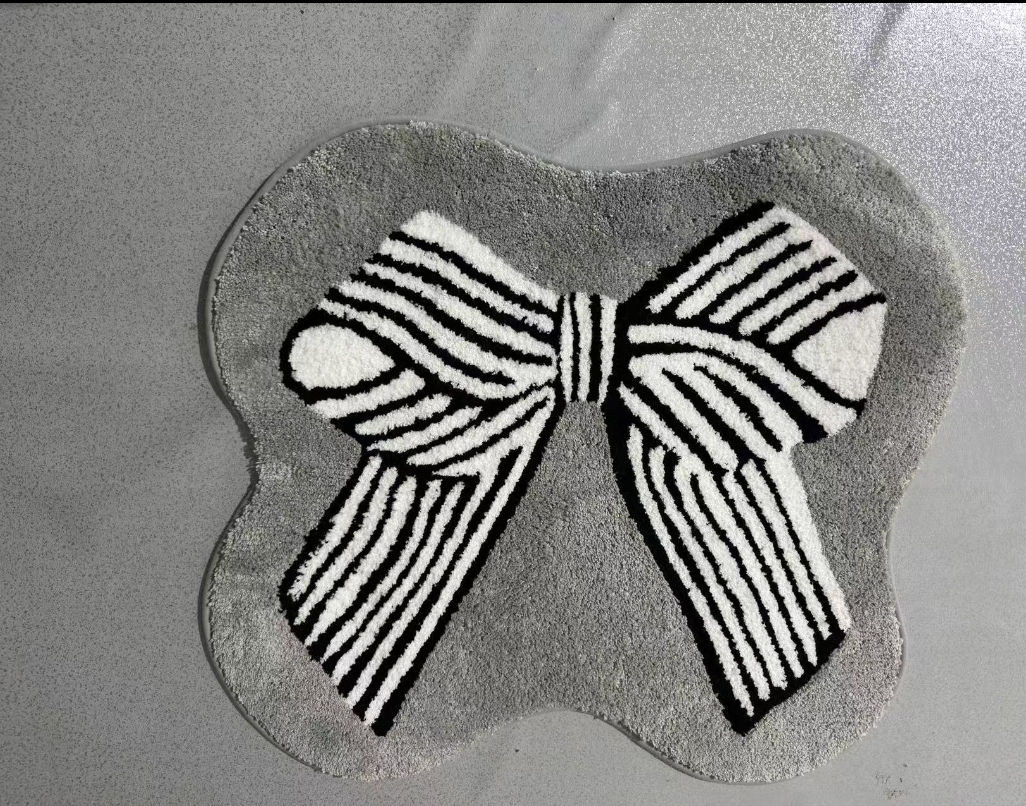 Gray white and black bow tie mat