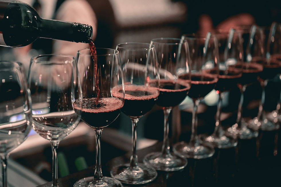 bartender-pouring-red-wine-into-wine-glass-restaurant-beverage-alcoholic-beverage-concept.