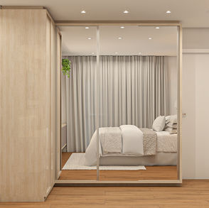 Suíte aconchegante e tons claros.