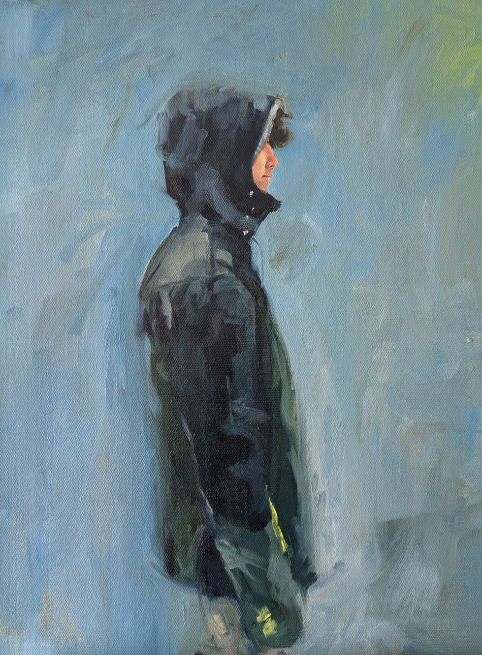 teenage boy, black coat, hood up, curly hair, side profile